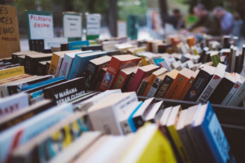 rows of books for sale can mean a bulk discount using our haggling tips
