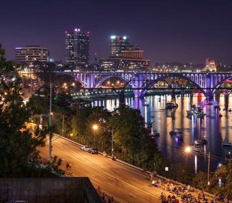 Bridge over a river at night in Knoxville, Tennessee
