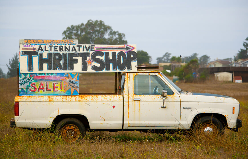a truck advertising a yard sale
